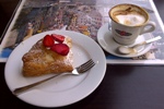 Typical breakfast of pastry & cappucino