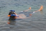 Lee snorkeling in the warm water off Pareti Bay