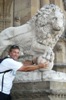 Stealing the futbol from a statue lion