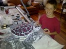 Jeffrey painting the bigger turtle