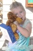 Tessa loves Grandpa Al's Teddy Bear!